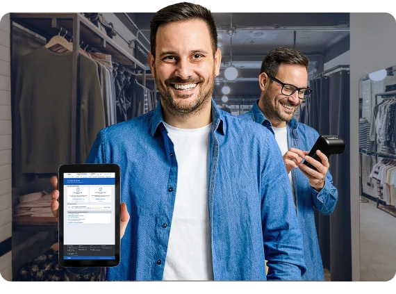 Empreendedor em loja de roupa exibe tablet com a antecipação de recebíveis online da Cielo.