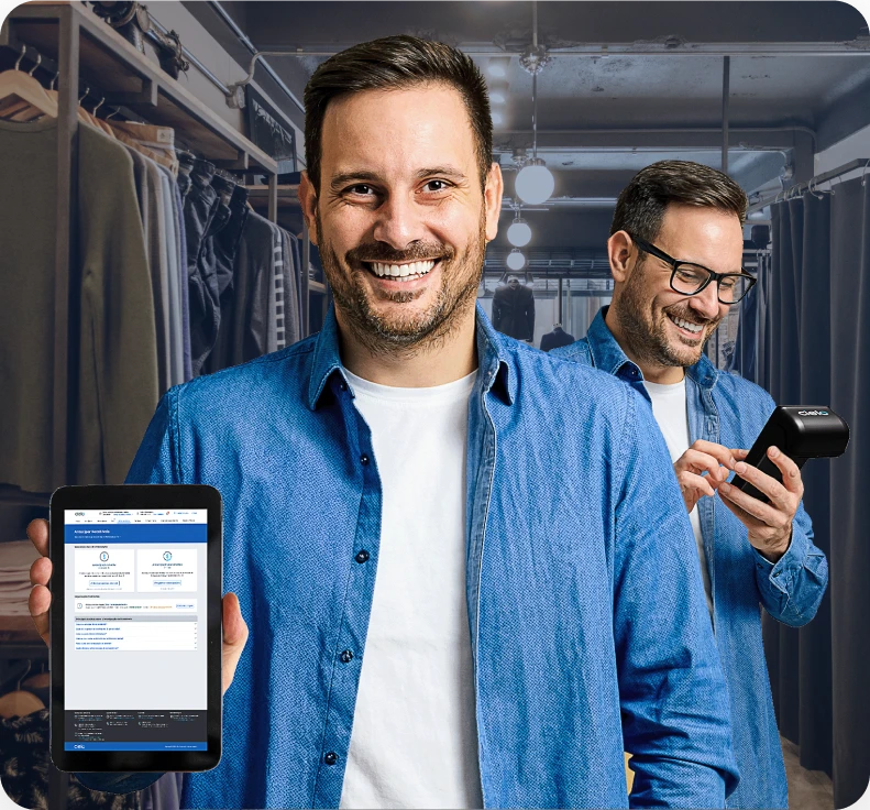 Empreendedor em loja de roupa exibe tablet com a antecipação de recebíveis online da Cielo.